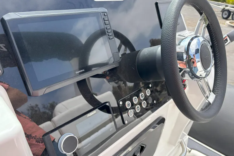 Slide: The Image of Steering console of 2026 Zodiac Medline 7.5 GT with Garmin display and controls. - 20