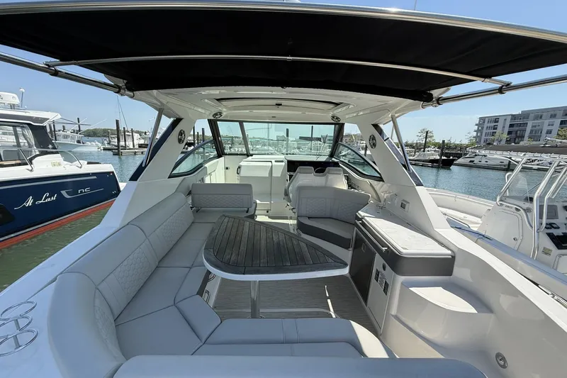 Slide: The Image of Luxurious 2023 Sea Ray Sundancer 320 yacht interior with spacious seating and elegant design. - 12