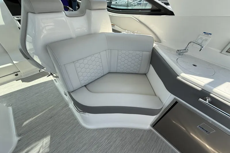 Slide: The Image of Luxurious seating area on 2023 Sea Ray Sundancer 320 yacht with modern design and amenities. - 14