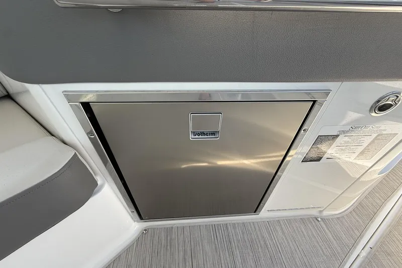 Slide: The Image of Stainless steel fridge on 2023 Sea Ray Sundancer 320 boat interior. - 17