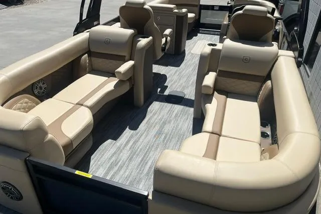 Slide: The Image of Luxurious interior of 2026 Godfrey Monaco 235 SB pontoon boat with plush seating. - 10
