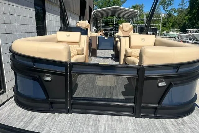 Slide: The Image of 2026 Godfrey Monaco 235 SB pontoon boat with luxurious seating and sleek design. - 6