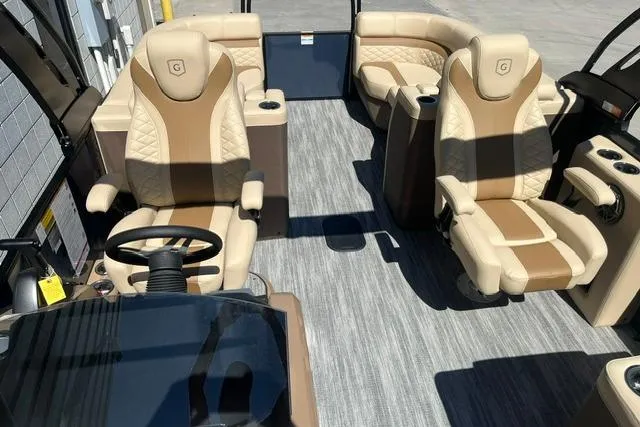 Slide: The Image of Luxurious interior of 2026 Godfrey Monaco 235 SB pontoon boat with plush seating and modern design. - 8