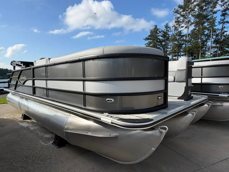 The Image of 2026 Bentley Pontoons Legacy 223 Swingback on a parking lot. - 0