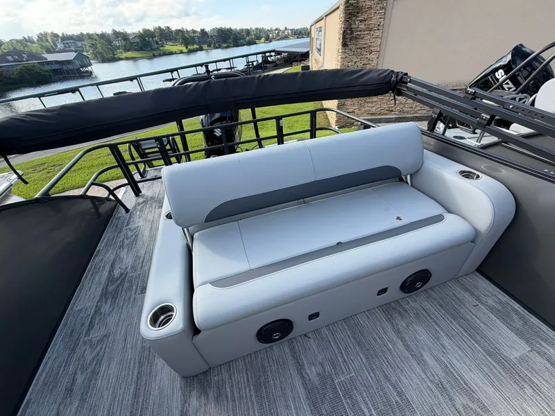 Slide: The Image of 2026 Bentley Pontoons Legacy 223 Swingback interior with gray sofa. - 7