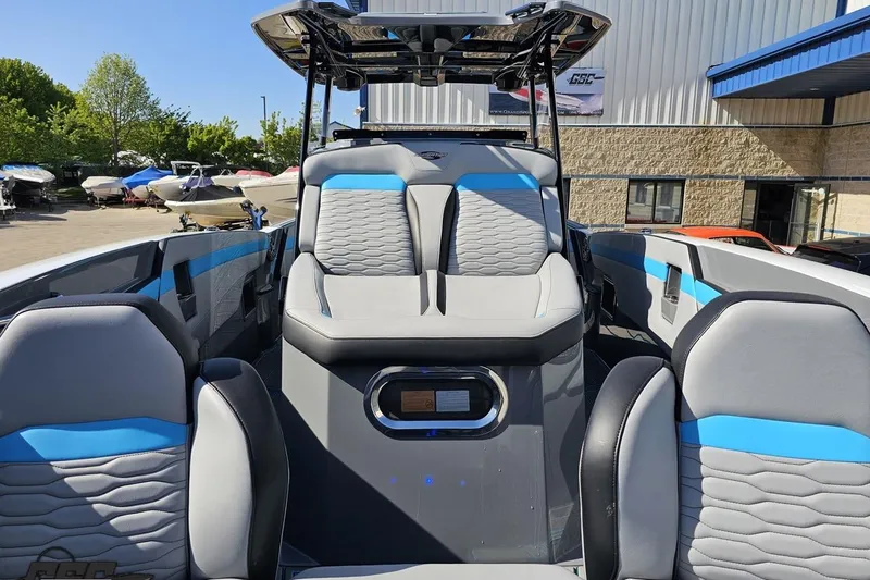 Slide: The Image of 2025 Sunsation 32 CCX boat interior with modern seating and sleek design. - 102