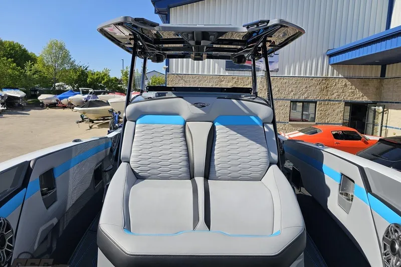 Slide: The Image of 2025 Sunsation 32 CCX boat interior with modern seating and sleek design. - 103