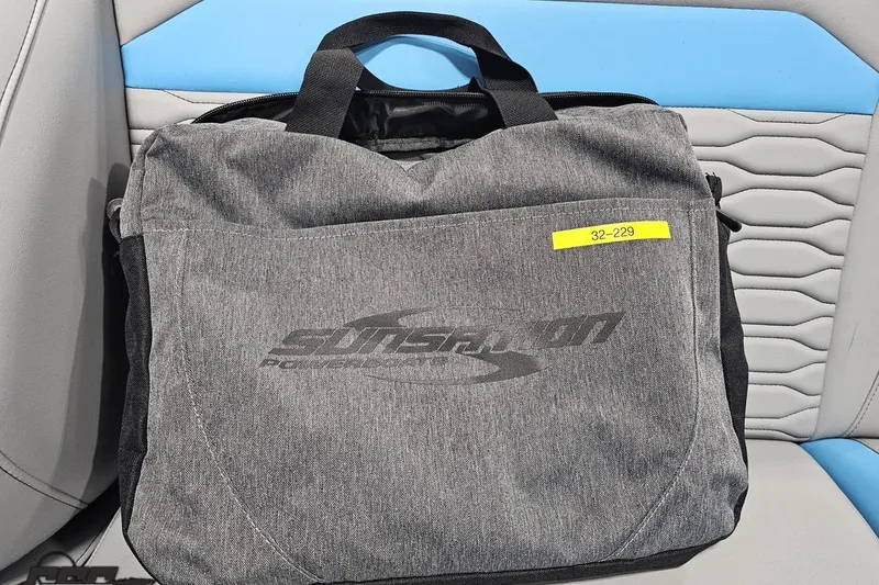 Slide: The Image of Gray Sunsation bag on a 2025 Sunsation 32 CCX boat seat. - 115