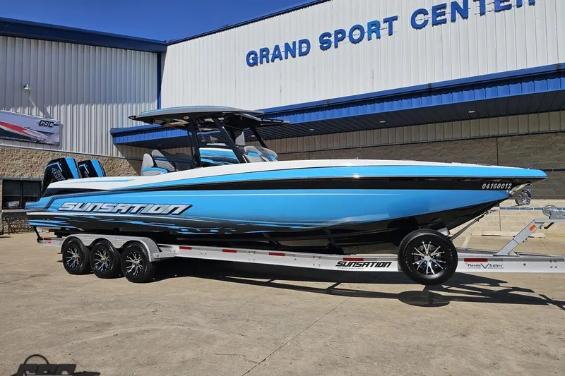Slide: The Image of 2025 Sunsation 32 CCX boat on trailer at Grand Sport Center. - 15