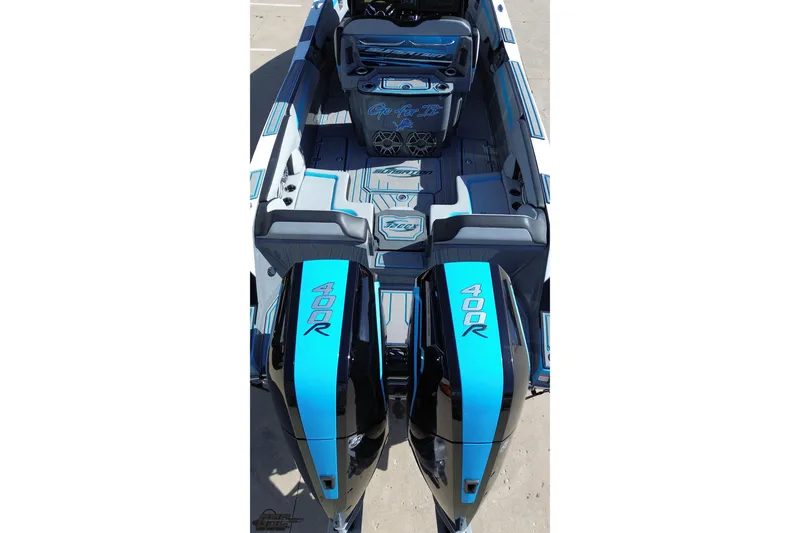 Slide: The Image of 2025 Sunsation 32 CCX boat with dual 400R engines, sleek design, and modern interior. - 44