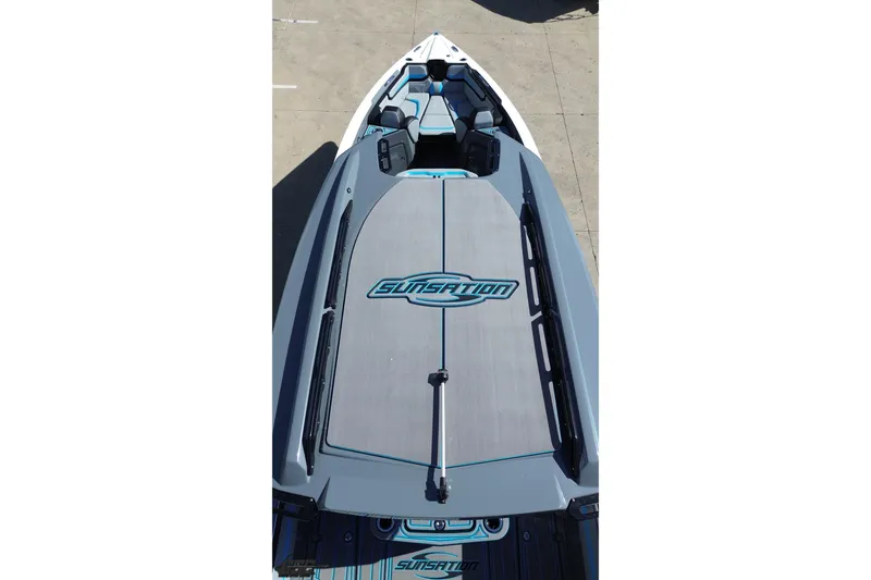 Slide: The Image of 2025 Sunsation 32 CCX boat, top view, showcasing sleek design and spacious deck. - 47