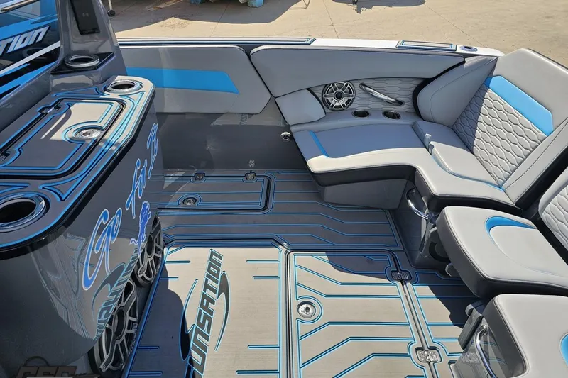 Slide: The Image of 2025 Sunsation 32 CCX boat interior with stylish seating and modern design elements. - 60