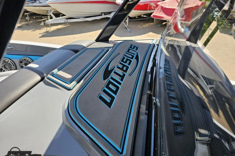 Slide: The Image of 2025 Sunsation 32 CCX boat interior with sleek design and branding details. - 72