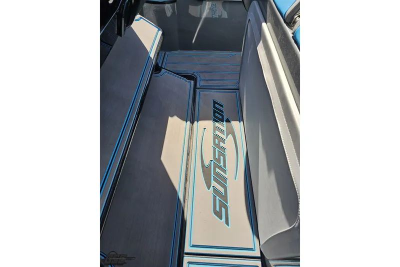 Slide: The Image of 2025 Sunsation 32 CCX boat interior with branded flooring and sleek design. - 75