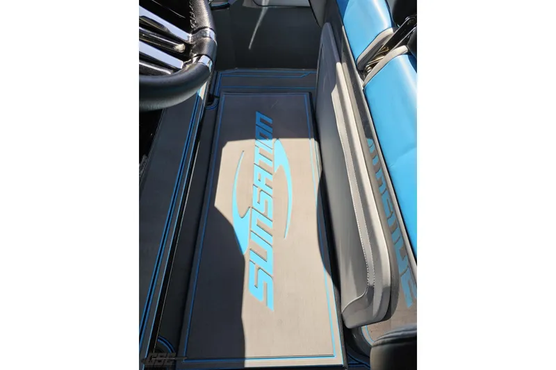 Slide: The Image of Interior of 2025 Sunsation 32 CCX boat with logo on floor mat. - 77