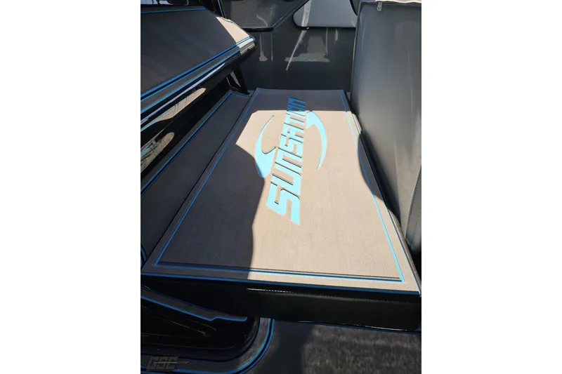 Slide: The Image of 2025 Sunsation 32 CCX boat interior with branded flooring and sleek design. - 78