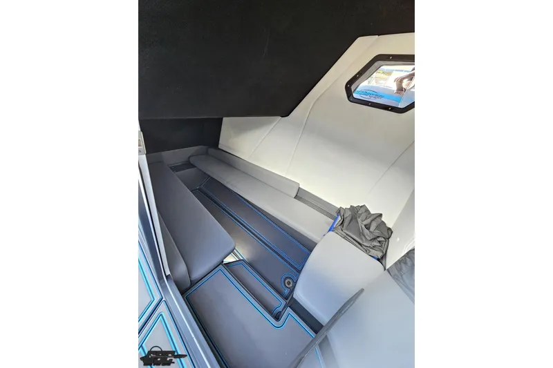 Slide: The Image of Interior cabin of 2025 Sunsation 32 CCX boat, featuring sleek seating and modern design. - 84