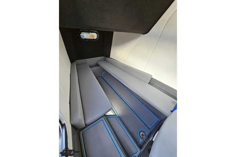 Slide: The Image of Interior cabin of 2025 Sunsation 32 CCX boat with sleek seating and modern design. - 85