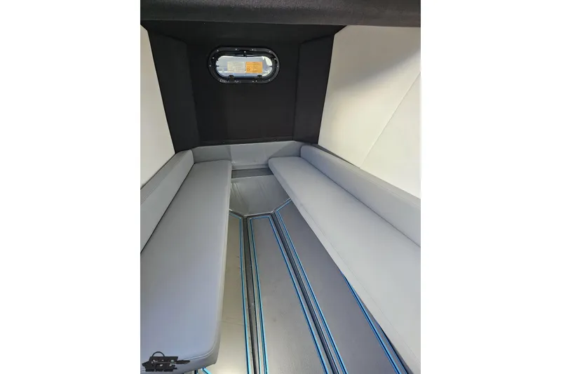 Slide: The Image of 2025 Sunsation 32 CCX cabin interior with sleek seating and modern design. - 86