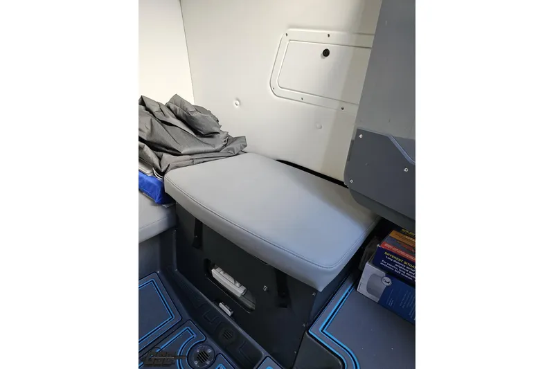Slide: The Image of Interior cabin of 2025 Sunsation 32 CCX boat with seating and storage. - 87