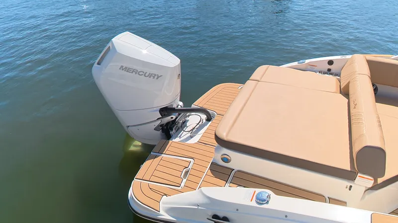Slide: The Image of The image shows the stern of a Sea Ray SDX 270 Outboard with a Mercury outboard motor. - 4