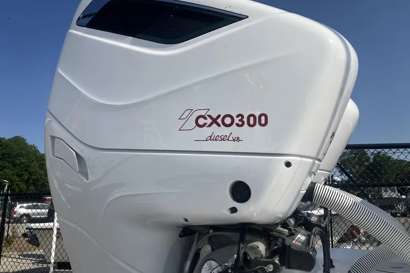 Slide: The Image of 2024 Albemarle 30 Express with CXO300 diesel V8 engine, close-up view. - 16