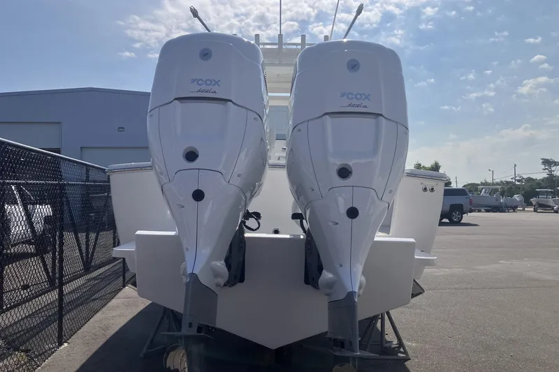 Slide: The Image of 2024 Albemarle 30 Express boat with twin Cox diesel outboard engines. - 7