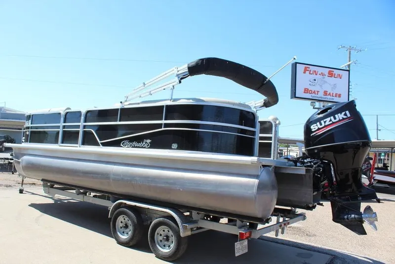 The Image of 2019 Misty Harbor 2285 Adventure Fishing pontoon boat with Suzuki outboard motor on trailer. - 1