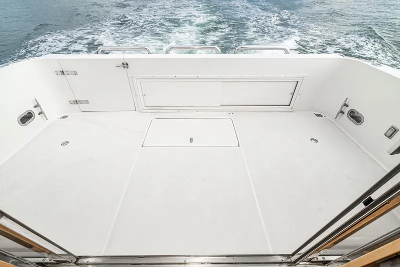 Slide: The Image of Spacious deck of 2006 Navigator 5100 yacht with ocean view. - 15