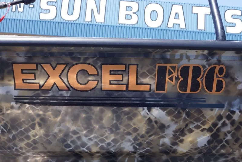 Slide: The Image of Excel 1751 F4 boat with camouflage design, 2021 model, at Sun Boats dealership. - 10