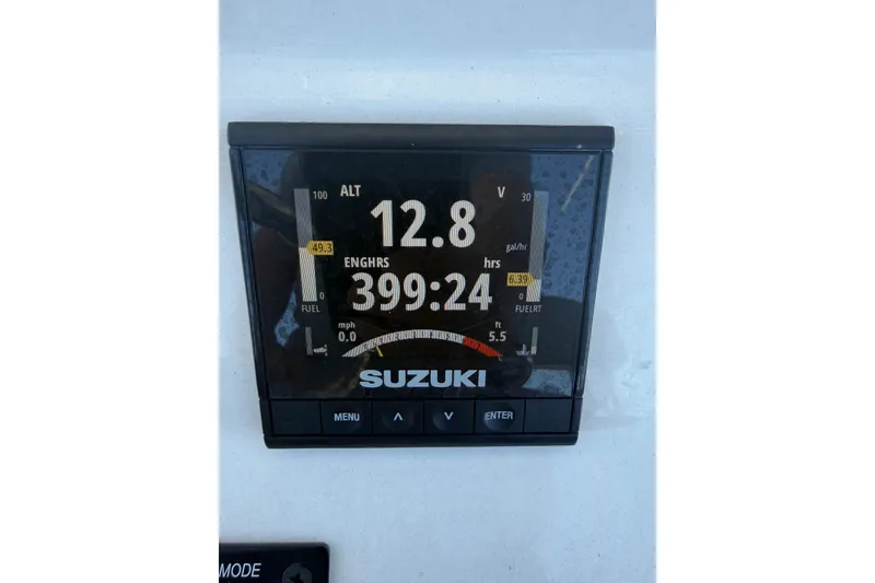 Slide: The Image of Suzuki engine display showing 399.24 hours on a 2020 Cape Horn 22 OS boat. - 11