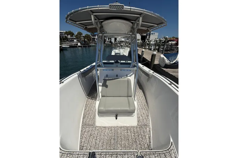 Slide: The Image of 2020 Cape Horn 22 OS boat with T-top, docked in a marina. - 4