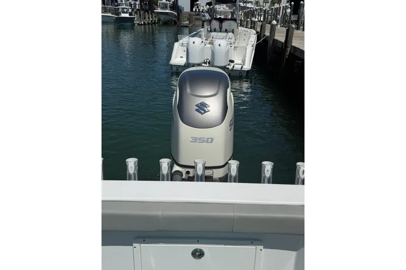 Slide: The Image of Cape Horn 22 OS 2020 boat with Suzuki 350 outboard motor at dock. - 8