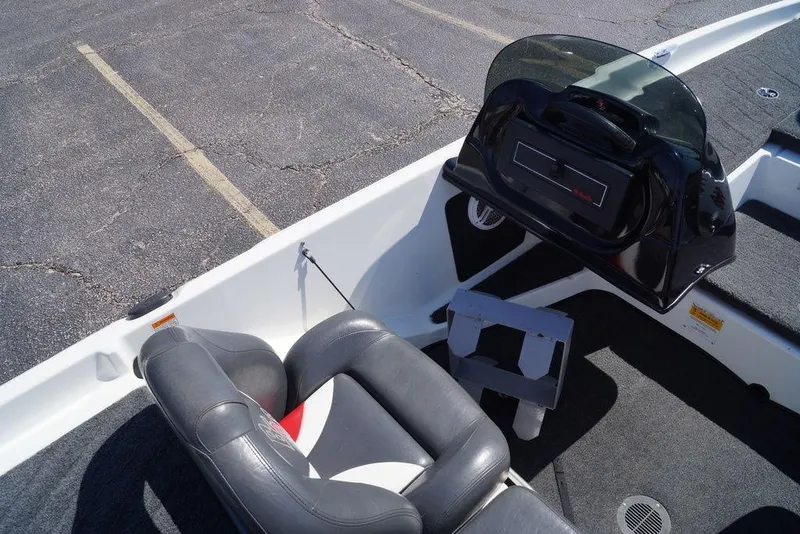 Slide: The Image of 2011 Bass Cat Pantera II boat interior with seating and dashboard view. - 10