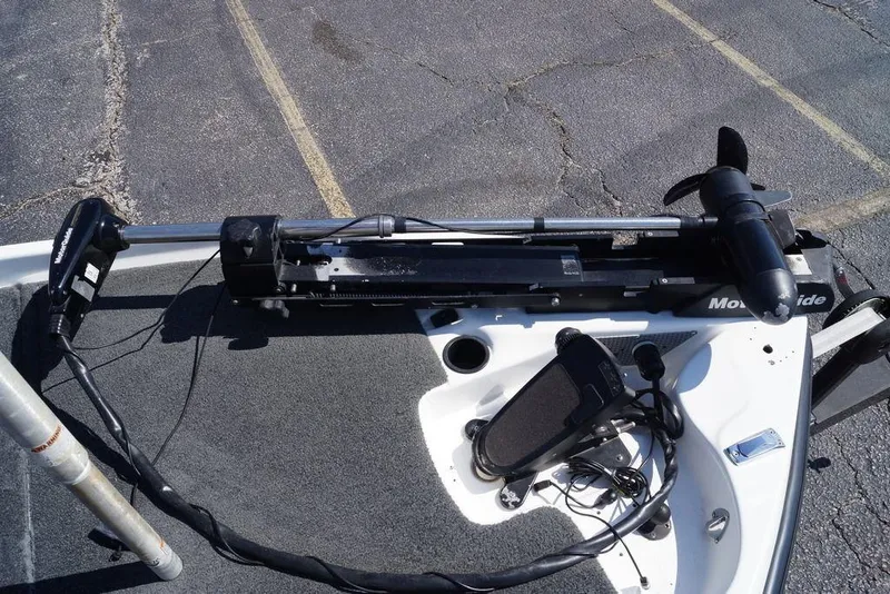 Slide: The Image of 2011 Bass Cat Pantera II boat with trolling motor and control panel on deck. - 17