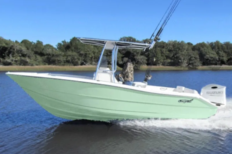 The Image of 2027 Bulls Bay 230 Center Console boat cruising on a calm lake. - 0
