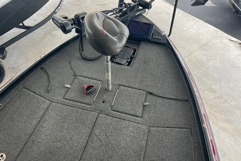 Slide: The Image of 2024 Nitro Z21 XL Pro boat interior with fishing seat and equipment. - 2