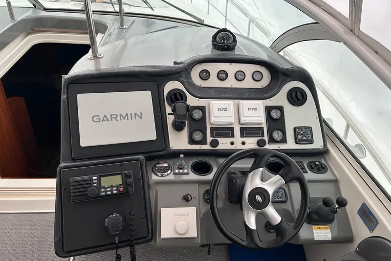 Slide: The Image of Helm of 2006 Cruisers Yachts 460 Express with Garmin navigation system. - 1