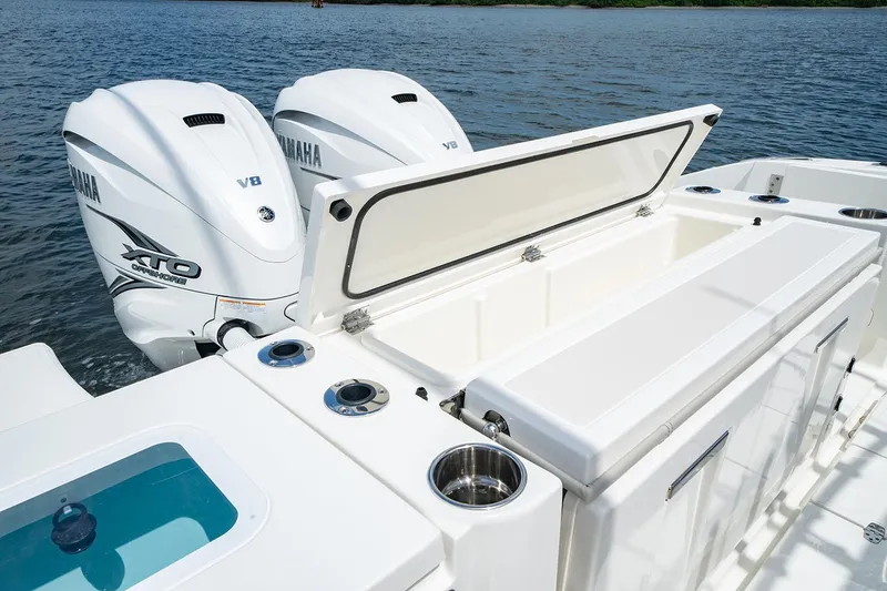 Slide: The Image of Manufacturer Provided Image: 2025 Pursuit S 358 Sport boat with Yamaha V8 engines on water. - 10