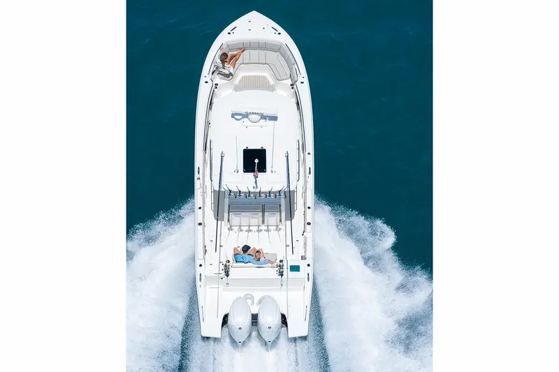 Slide: The Image of Manufacturer Provided Image: Overhead view of 2025 Pursuit S 358 Sport boat cruising on water. - 4
