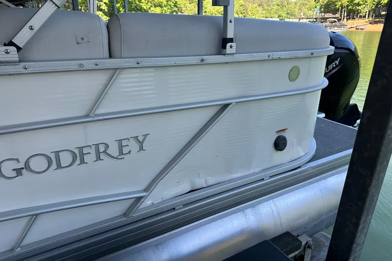 Slide: The Image of 2022 Godfrey Sweetwater 2286 SB pontoon boat docked on a sunny day. - 3