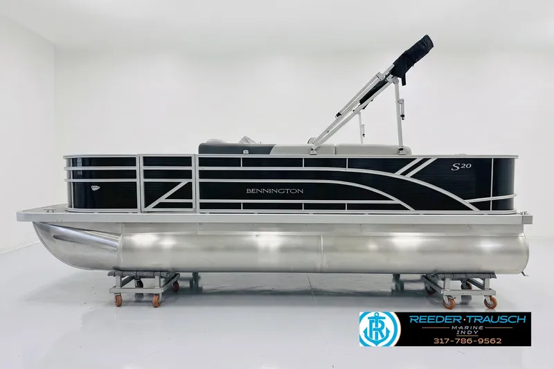 The Image of 2026 Bennington 20 SF pontoon boat with sleek black design and modern features. - 1