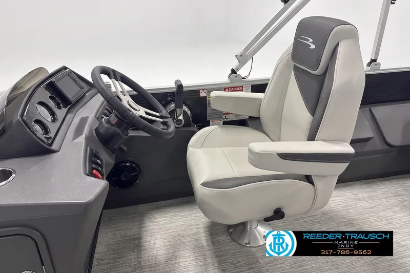 Slide: The Image of 2026 Bennington 20 SF boat interior with steering wheel and captain's chair. - 3