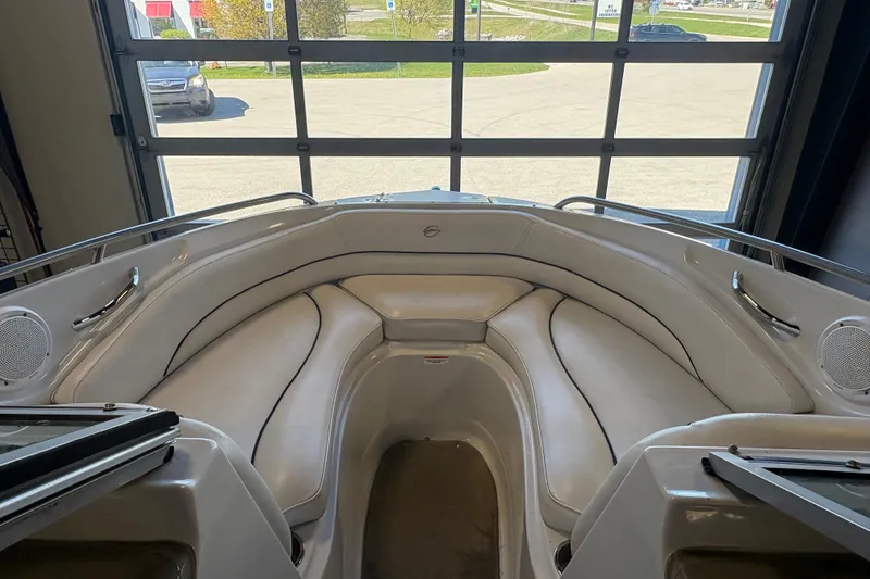 Slide: The Image of Interior view of a 2008 Crownline 210 LS boat with white seating. - 15