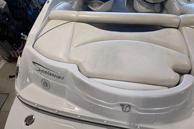 Slide: The Image of 2008 Crownline 210 LS boat with white seating and "Spontaneous" name on the stern. - 7