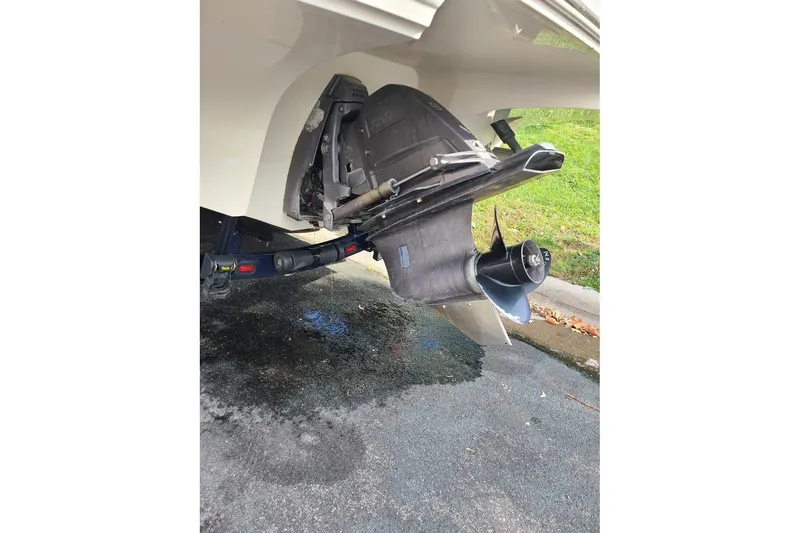 Slide: The Image of Rear view of a 2009 Bryant 268 boat's outboard motor and propeller. - 13