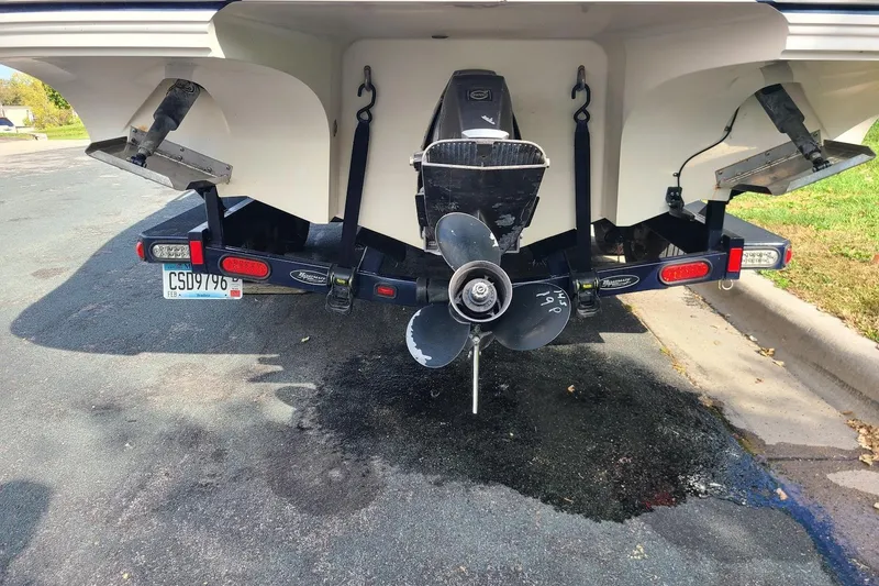Slide: The Image of Rear view of a 2009 Bryant 268 boat with propeller and trailer. - 14
