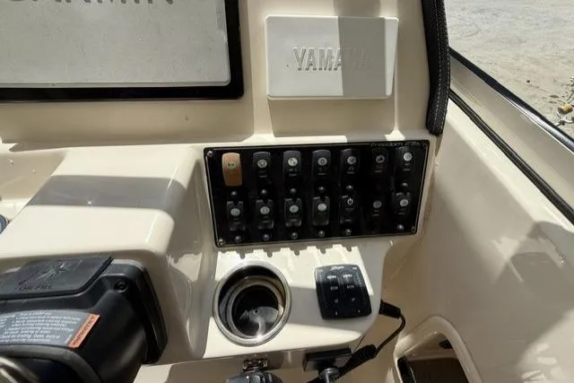 Slide: The Image of Control panel of 2017 Grady-White Freedom 235 boat with Yamaha components. - 16