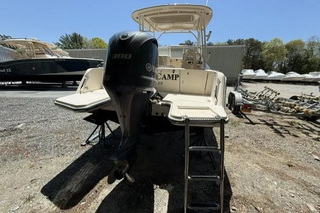 Slide: The Image of 2017 Grady-White Freedom 235 boat with Yamaha 300 engine, parked outdoors. - 27