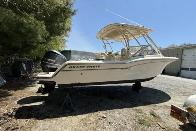 Slide: The Image of 2017 Grady-White Freedom 235 boat on dry land with Yamaha engine. - 3